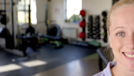 smiling woman in rehabilitation gym, focusing on recovery and fitness journey, copy space