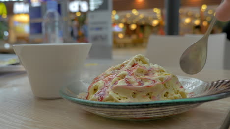 eating dessert in trade centre cafe