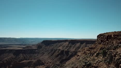 Fish-River-Canyon-in-Namibia,-Africa-Aerial-Drone-Shot