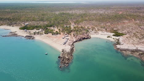 aerial, remote campground on remote tropical northern australia kimberley coast, pullback