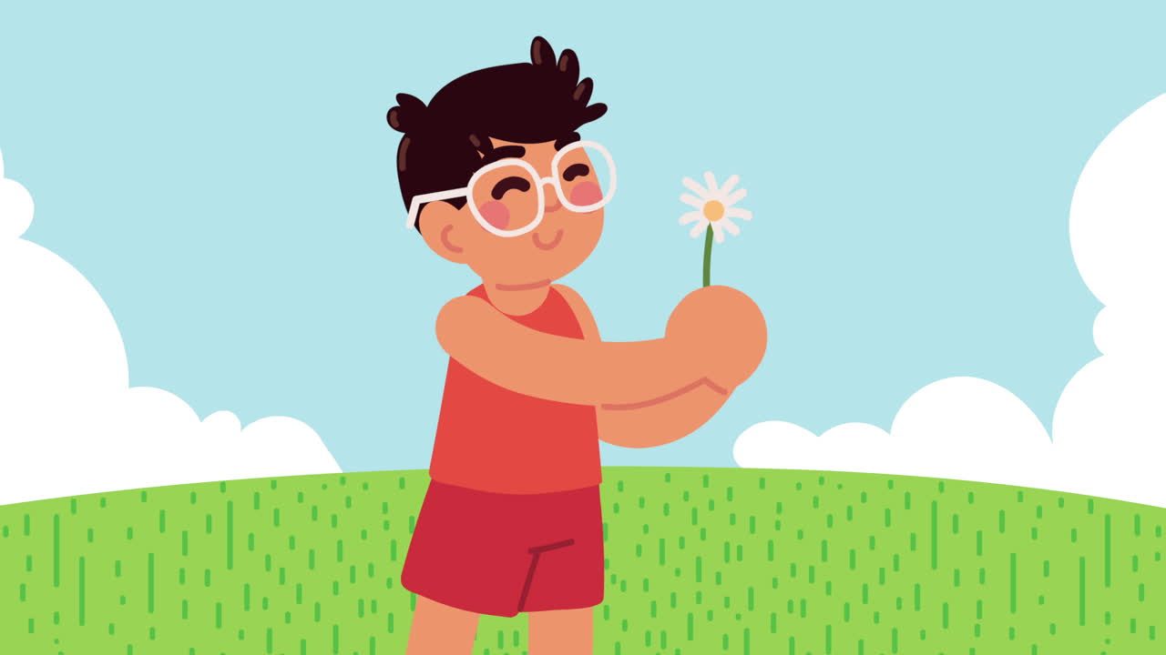 niño sosteniendo una flor en un prado