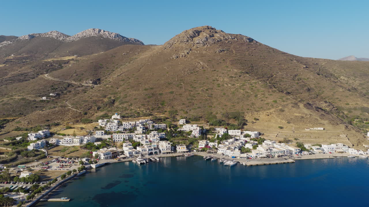 Aerial view of Katapola village in Amorgos island, traditional Cycladic houses, Greek summer travel