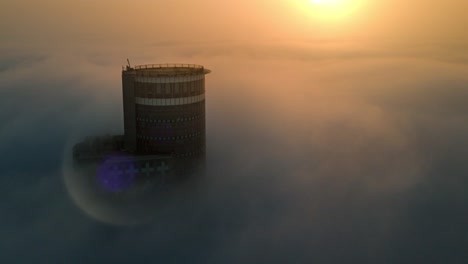 tower above the clouds at sunrise