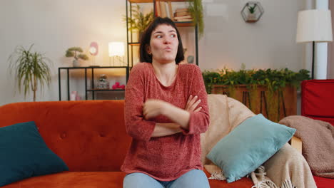 confused woman raising hands asking why what reason of failure demonstrating disbelief irritation