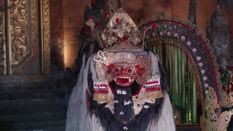 balinese barong dance show at night ubud palace in bali, indonesia - close-up