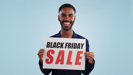 Man,-excited-and-poster-sign-for-Black-Friday-sale