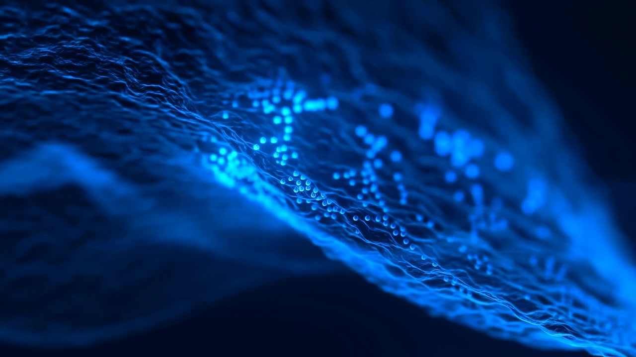 Fine blue strands undulate through darkness while luminous particles gather and spread along curved surfaces, creating layered flowing forms with bright cyan highlights.