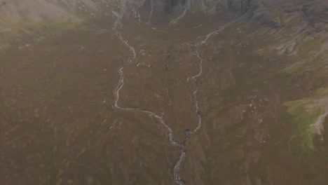 Drone-shot-of-green-landscape-in-isle-of-skye-scotland