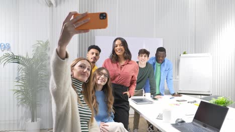 Business team taking a selfie in the office