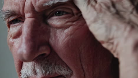 close-up portrait of an elderly man in contemplation