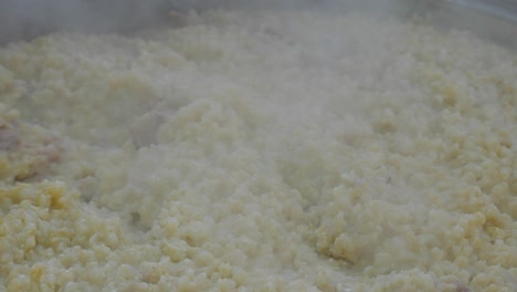 Close-up-of-making-Resi,-a-traditional-wheat-and-meat-dish-served-at-Cypriot-wedding-celebrations