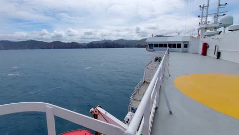 a view of the south island ahead of a ferry as it crosses the cook strait in new zealand