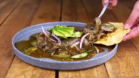 Aguachile-plate,-traditional-Mexican-dish-on-a-wooden-table