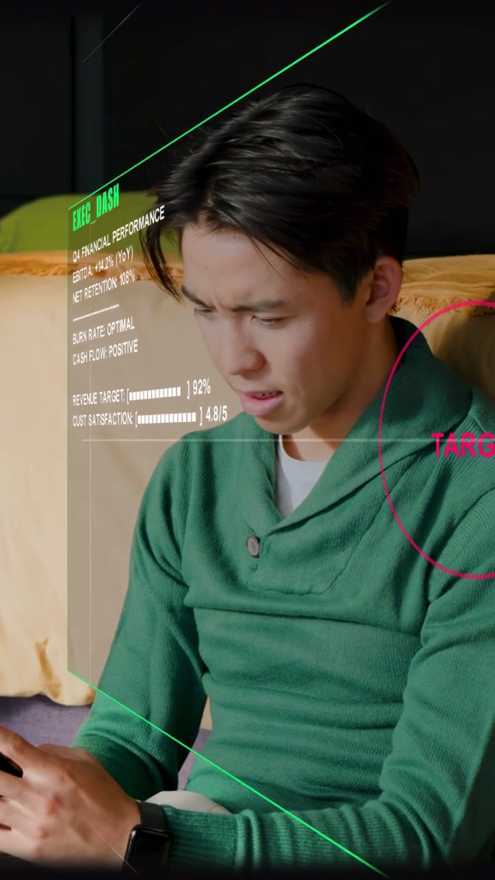 Adult man tapping smartphone and causing AR HUD displaying business metrics showing rising stress