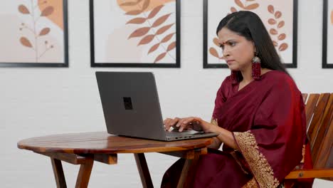 indian woman using laptop