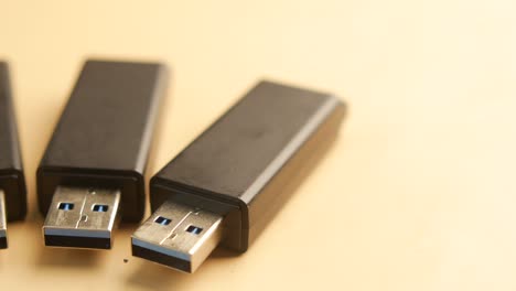 three black usb flash drives