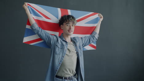 man holding the uk flag
