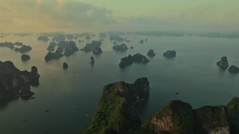 aerial shot capturing surreal beauty of halong bay in vietnam on a foggy morning