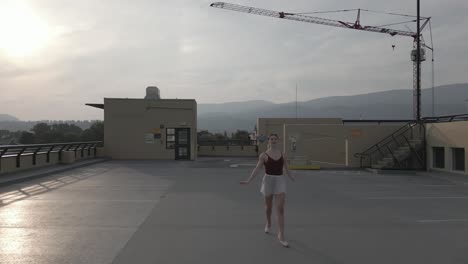 Dancer-chasing-across-a-parkade-roof