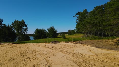 parking lot to grass with drone in summer