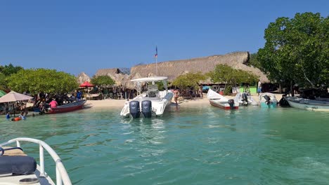 cartagena, colombia. arriving on cholon party island, boats and people