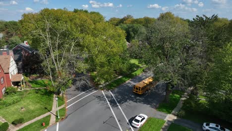 yellow school bus in american neighborhood