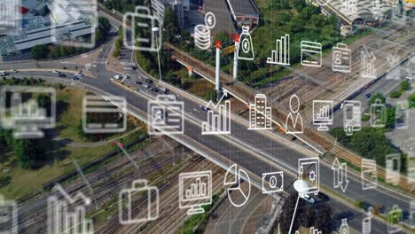 Animación-De-Múltiples-íconos-Sobre-Vista-Aérea-De-Vehículos-En-Movimiento-En-Carreteras-De-La-Ciudad
