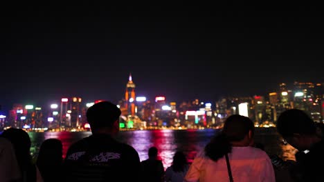 people enjoying hong kong's vibrant skyline