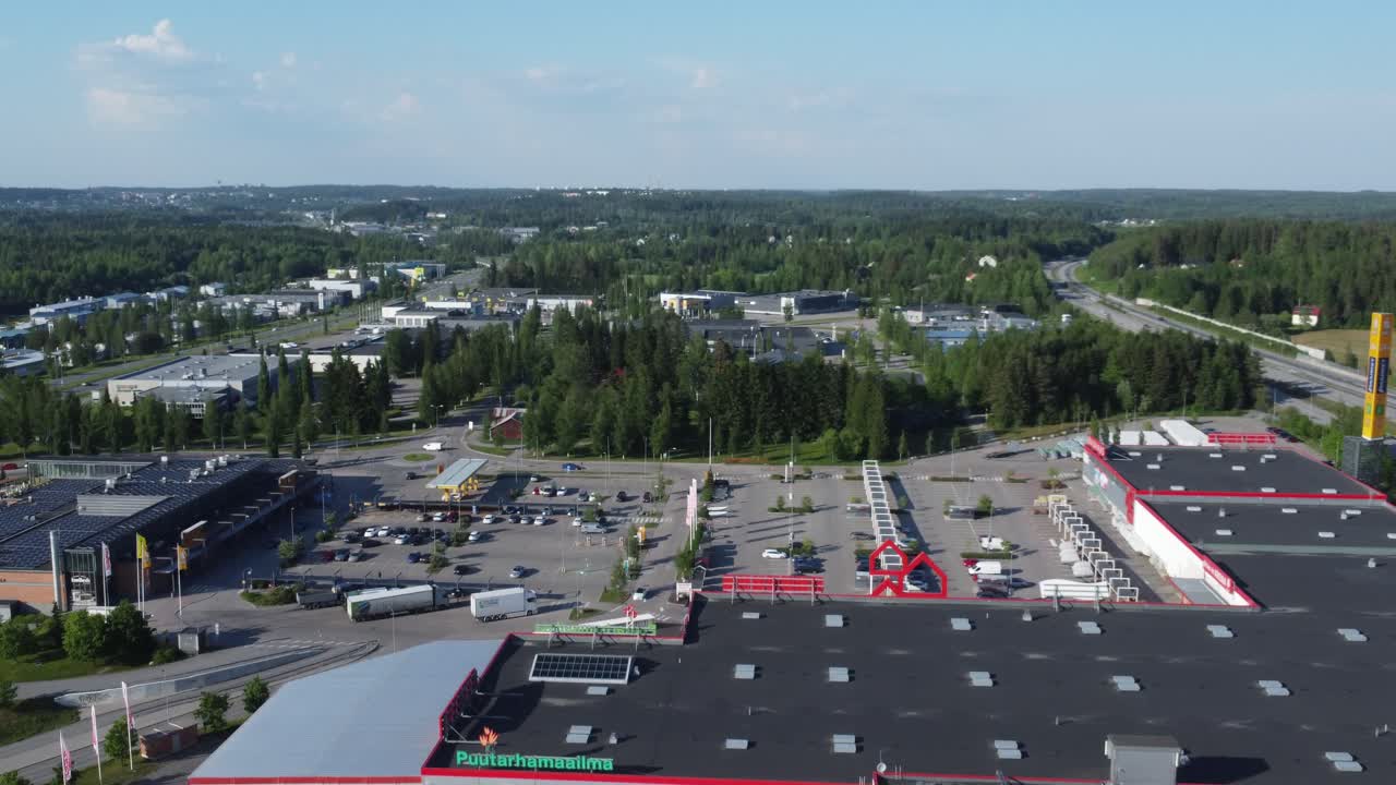 Low flyover of hardware store and supermarket in Lahti, Finland