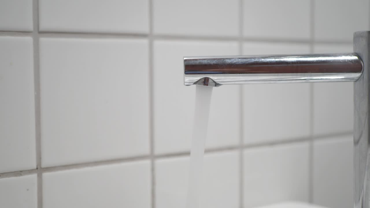 Running Water from a Chrome Faucet