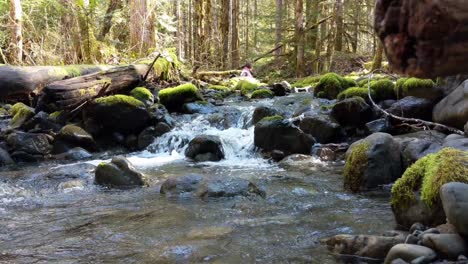 Shaman---Sangoma-at-waterfall-doing-water-ceremony-in-the-Olympic-National-Forest,-Washington-State