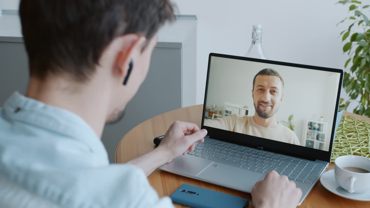 Man having a video call on laptop
