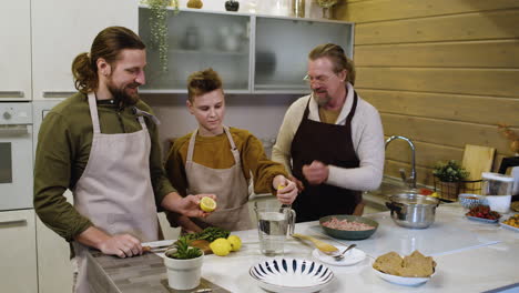 Caucasian-men-and-boy-in-the-kitchen