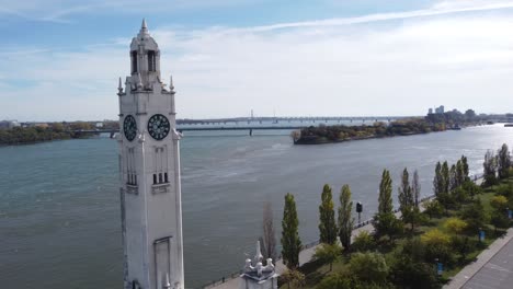 drone-rotate-around-the-Montreal-Clock-Tower-in-Old-port-warm-afternoon-light-Quebec-Canada