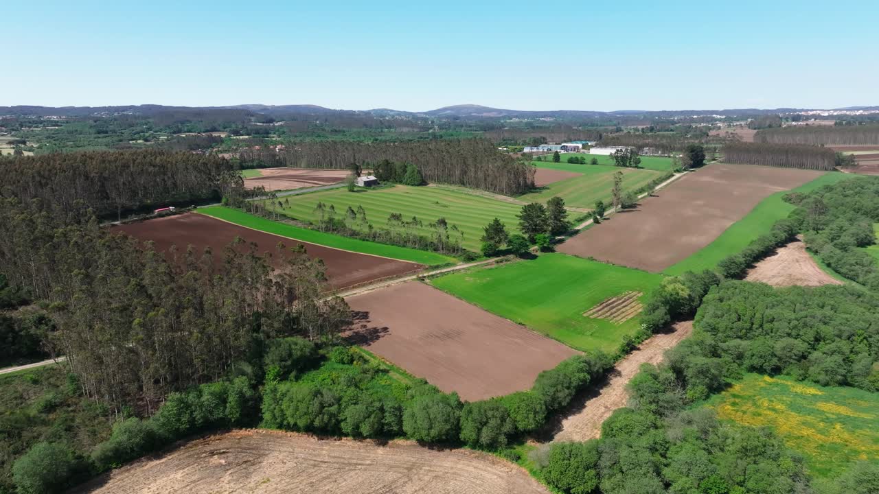 Vista Of Farmlands During Sunny Day Near Countryside Town