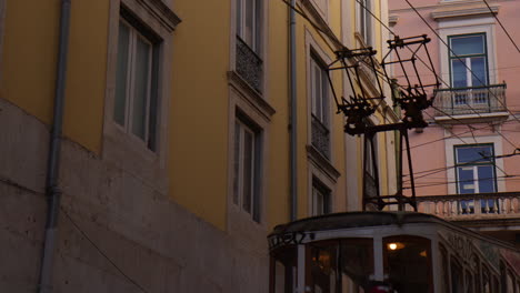 vintage cable car in the old town of lisbon, portugal