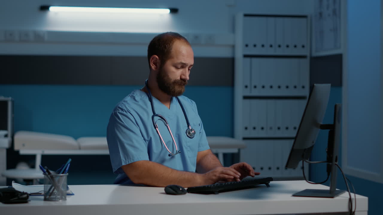 Doctor working on computer in clinic