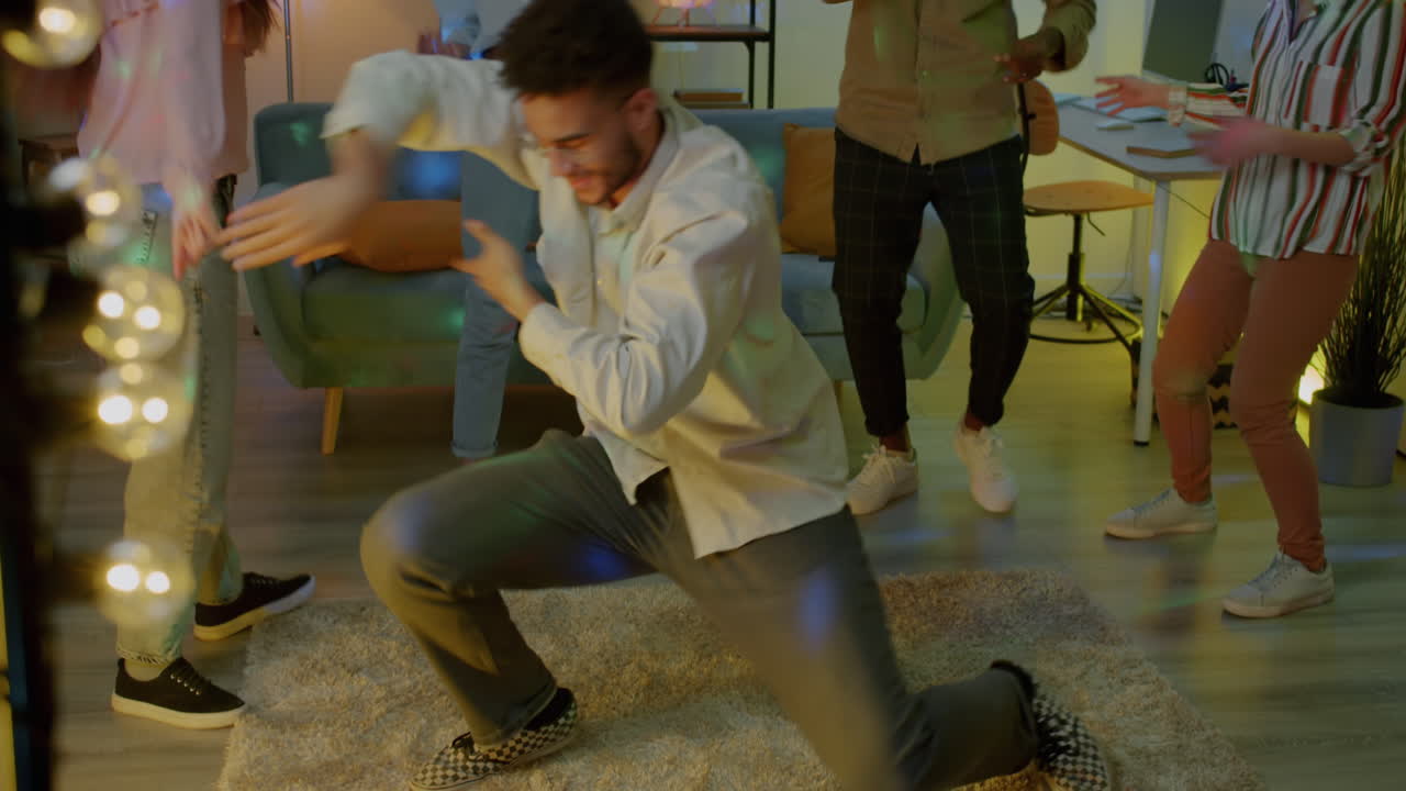 Friends Dancing at a Home Party