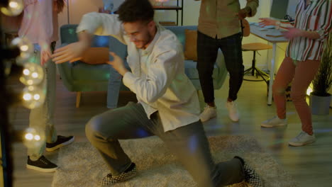 friends dancing at a home party