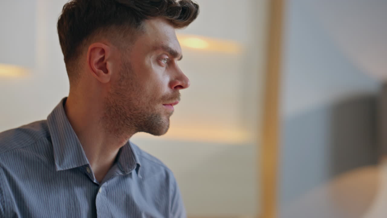 Focused entrepreneur looking documents working at office workplace close up.