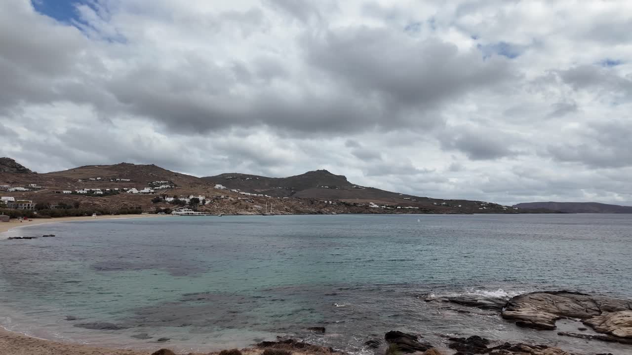 famous warm clear waters of Mykonos, Greece in this beach reveal in the off-season