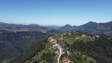 Historic-town-of-Zacatlan-at-the-ridge-of-mountains,-Puebla,-Mexico,-Aerial-View