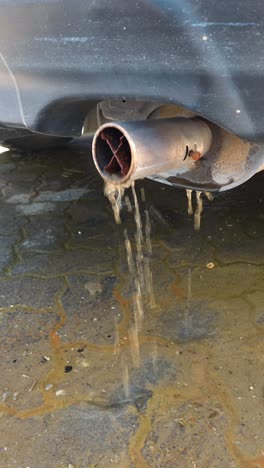 floodwater emerges from a car's exhaust after starting it