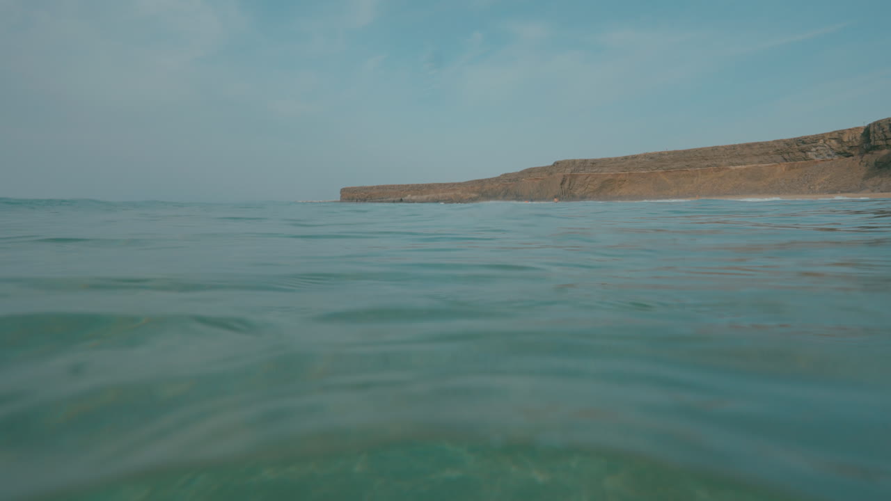 Underwater View of a Coastal Cliff and Ocean