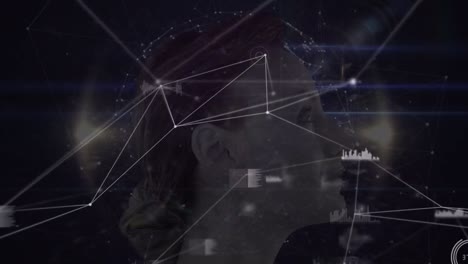 animation of network of connections and woman head globe over dark background