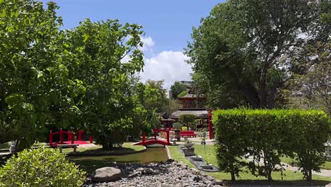 beautiful japanese garden with red bridges