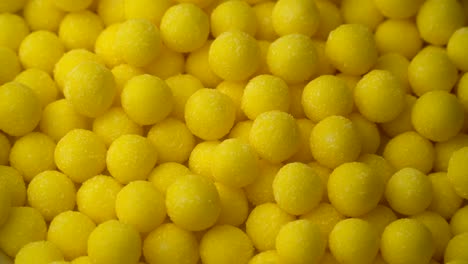 sweet lemon candy mixed of snack sugar rotate background