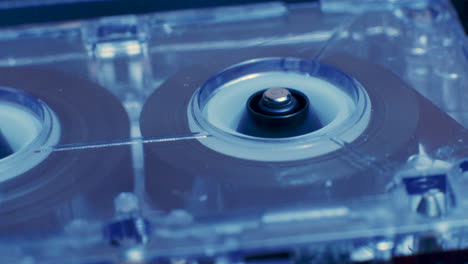 microcassette recorder tape being adjusted while rewinding