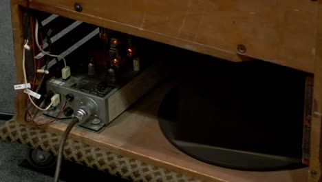 leslie speaker - combined amplifier and loudspeaker in wooden cabinet at music studio. closeup shot
