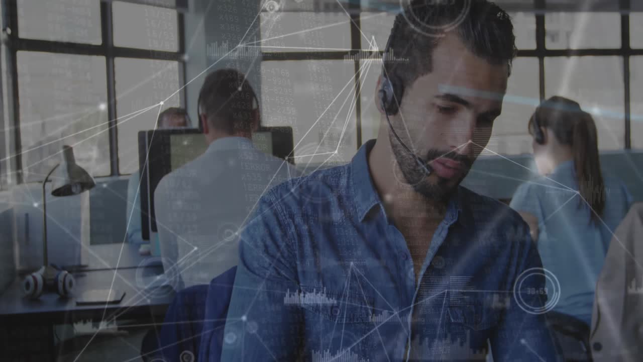 Agent tapping tablet in tech hub with network graphics intensifying, charts tracking live data flow